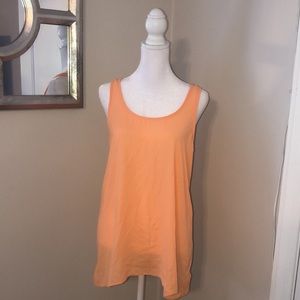 EUC LUSH orange tank with feminine frilly details in the back